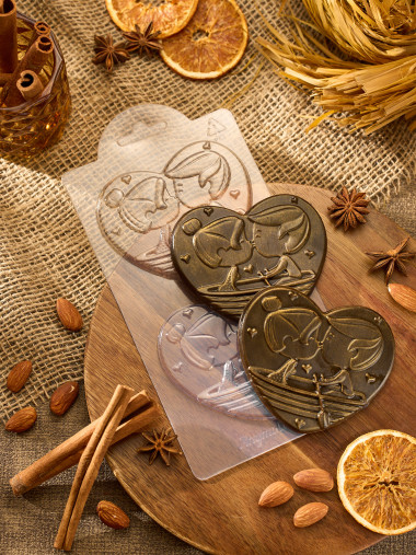 Парочка в лодке, шоколадные медальки пластиковая форма — ANYMOLDS ПРОИЗВОДСТВО ПЛАСТИКОВЫХ ФОРМ ДЛЯ МЫЛА, ШОКОЛАДА, ГИПСА